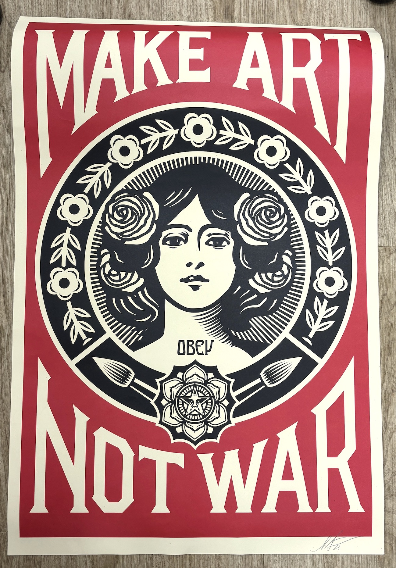 Shepard Fairey (b.1970)- coloured print, 'Make art not war', signed in pencil, unframed, 90 x 60cm